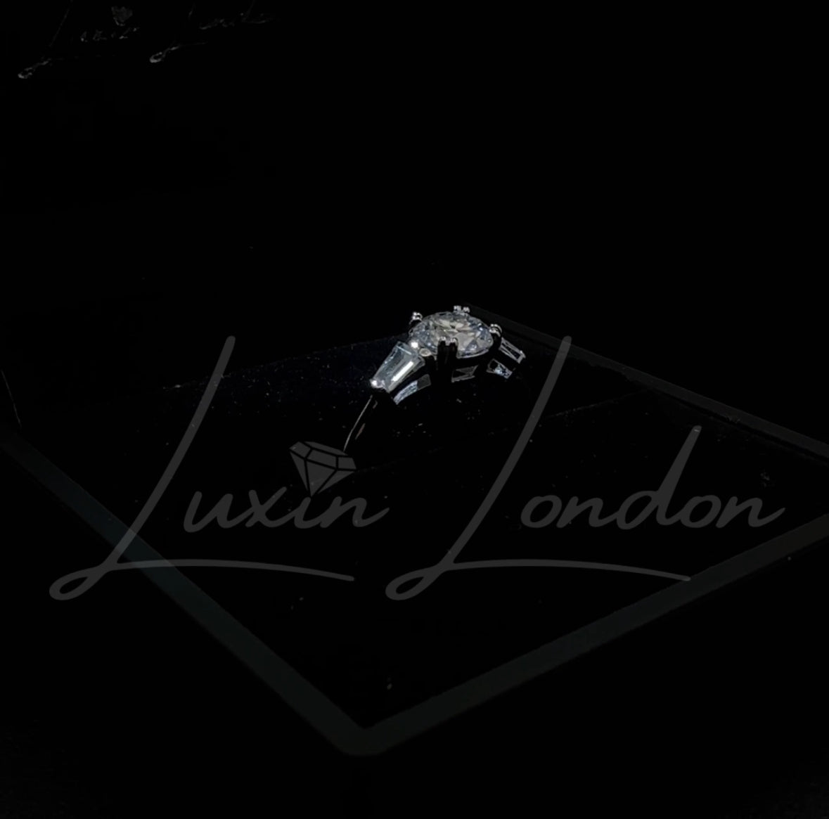 Trilogy Cosmic Moissanite Diamond Ring.