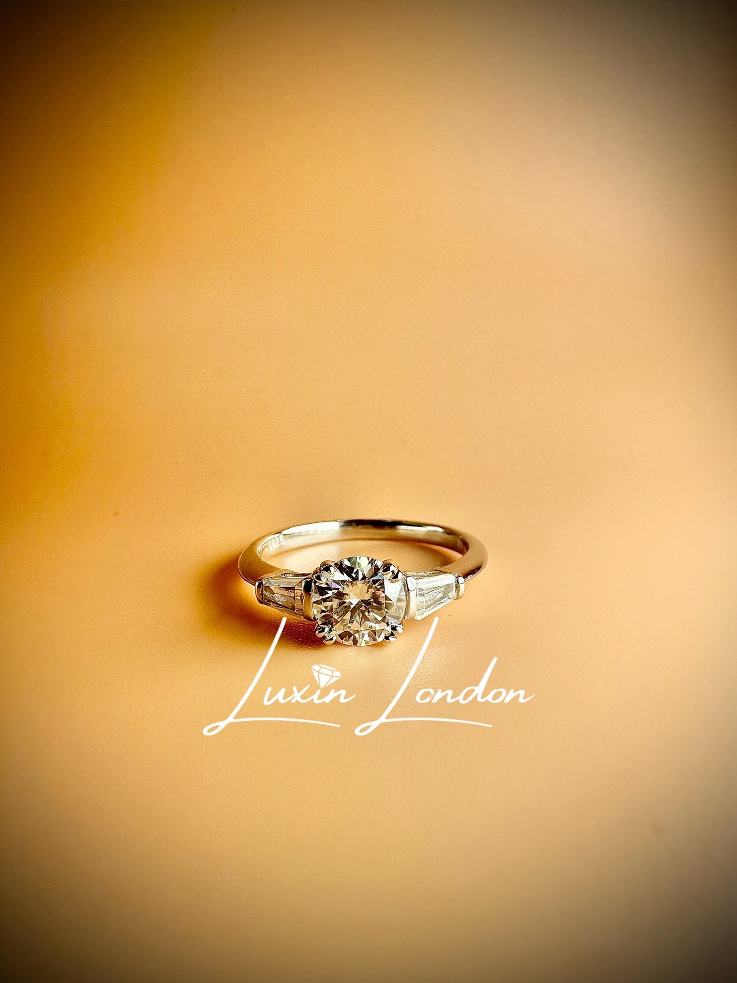 Trilogy Cosmic Moissanite Diamond Ring.