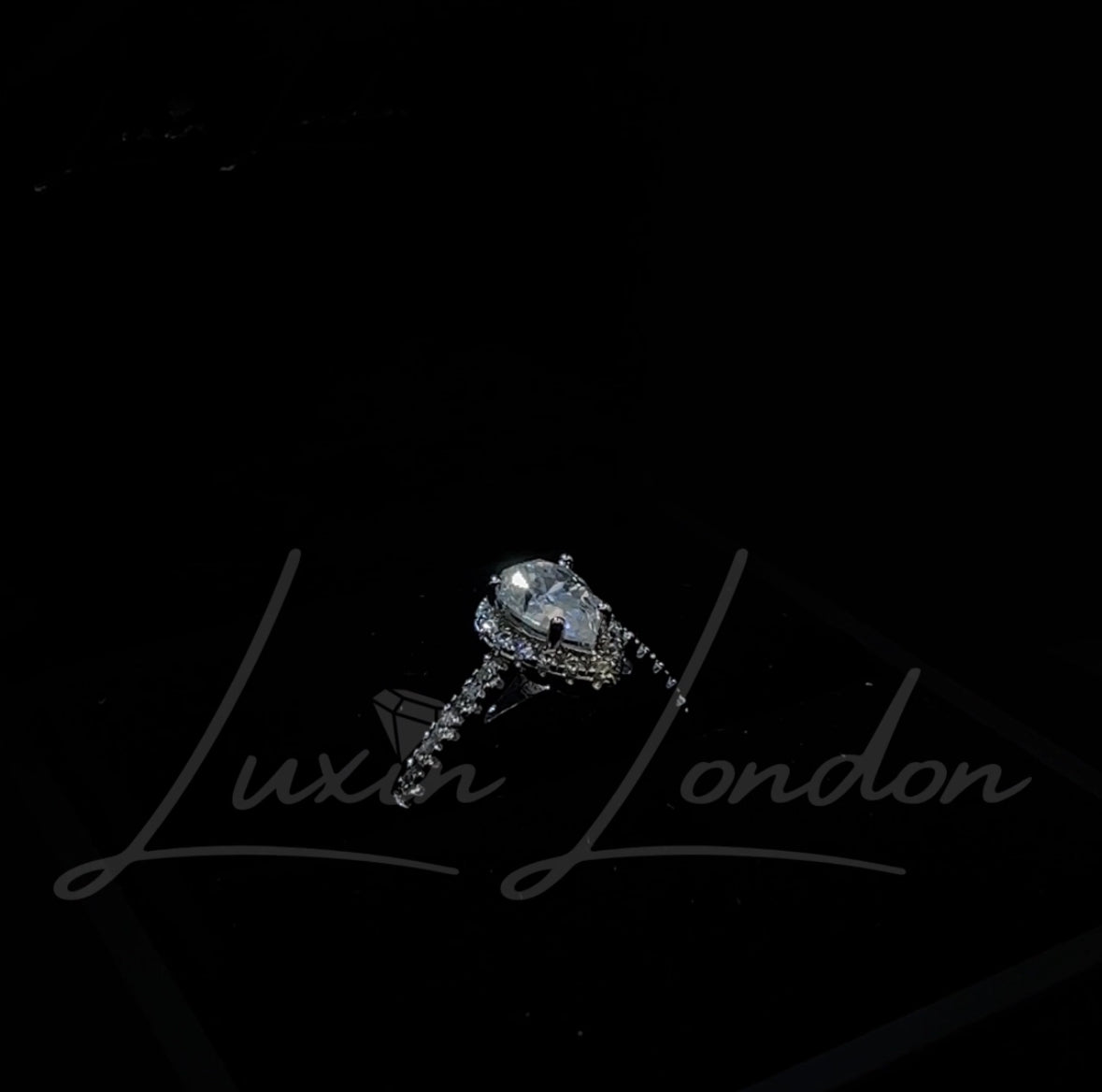 Enchanted Pear Moissanite Diamond Ring